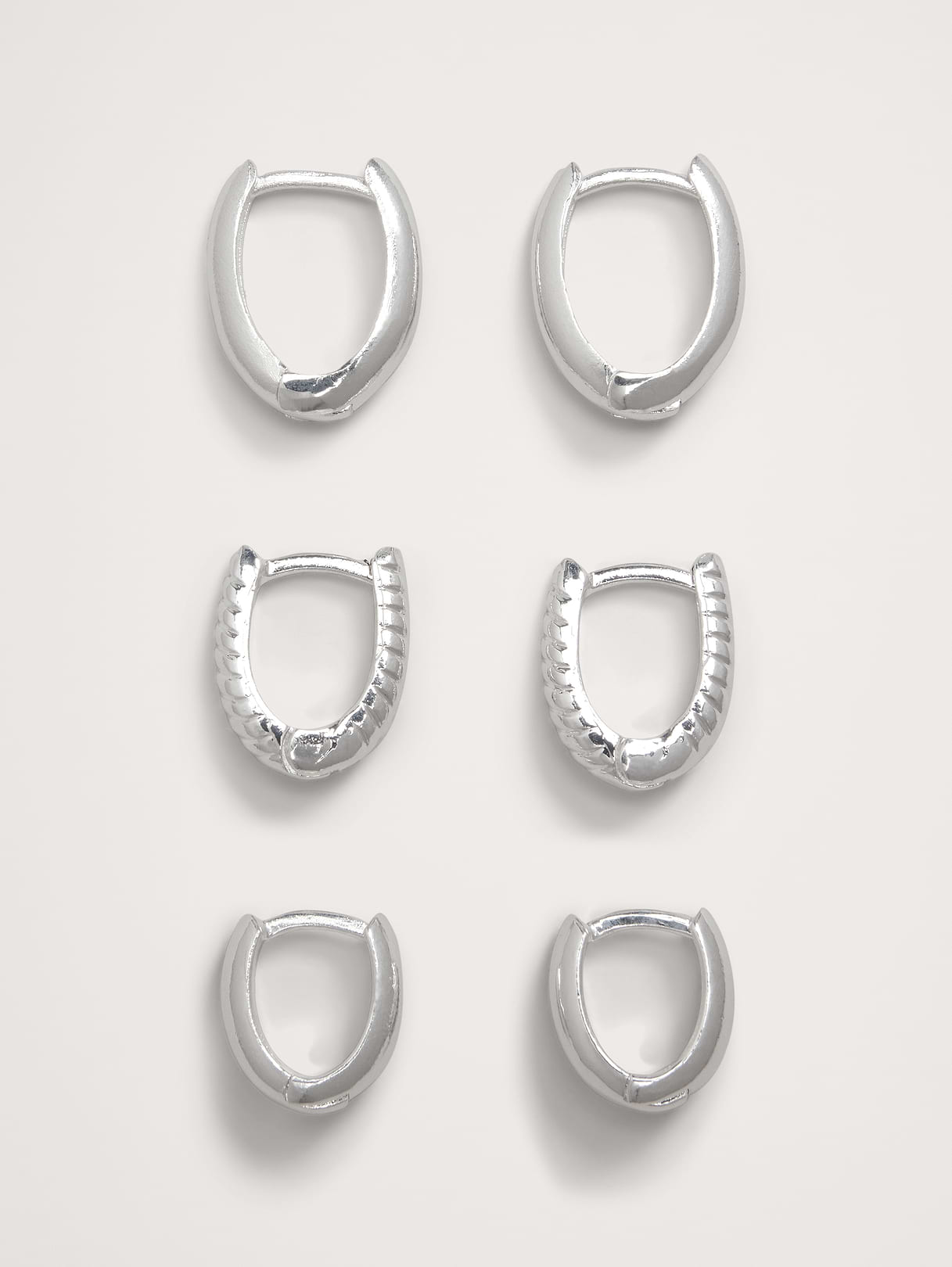 Ravena Oval Huggie Hoop Earrings Set Of 3 by Aureus + Argent - Silver